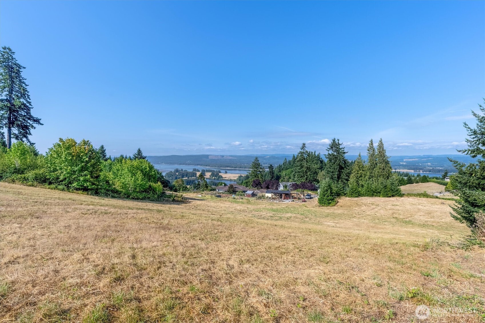 110 Jade Road Woodland, WA 98674 - Photo 12 of 32 a street view with residential houses