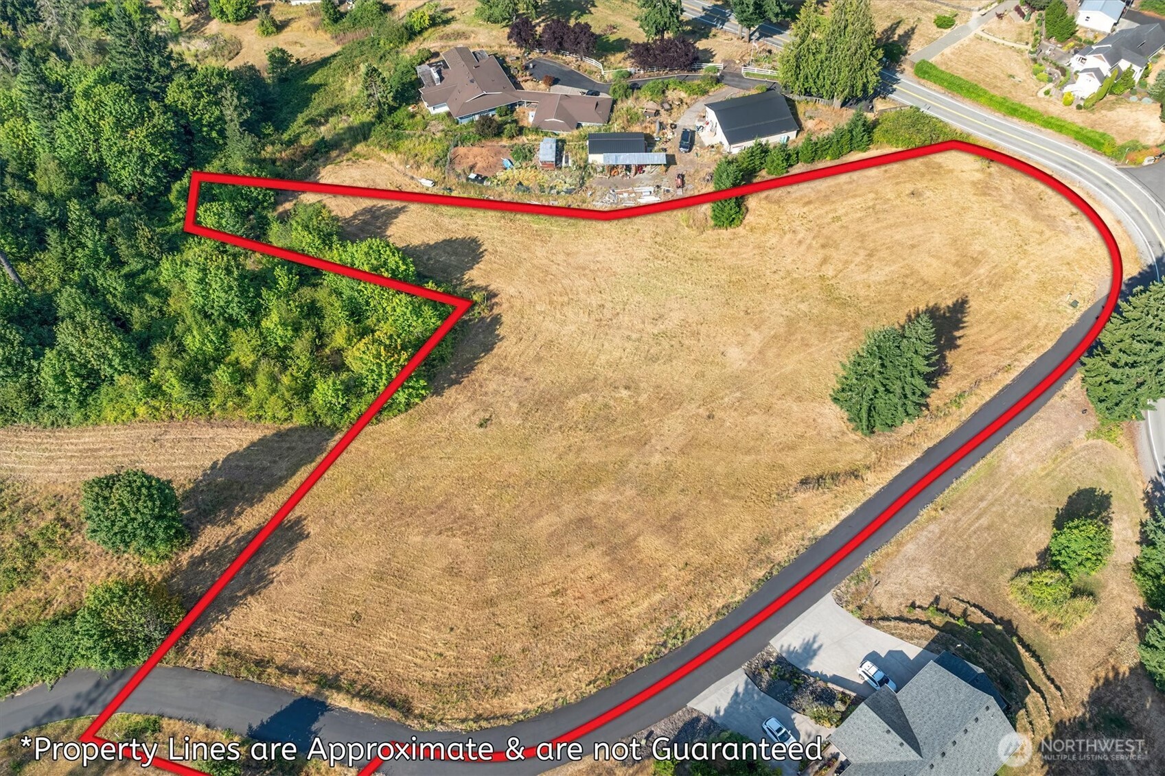 110 Jade Road Woodland, WA 98674 - Photo 19 of 32 swimming pool view with a garden and seating area