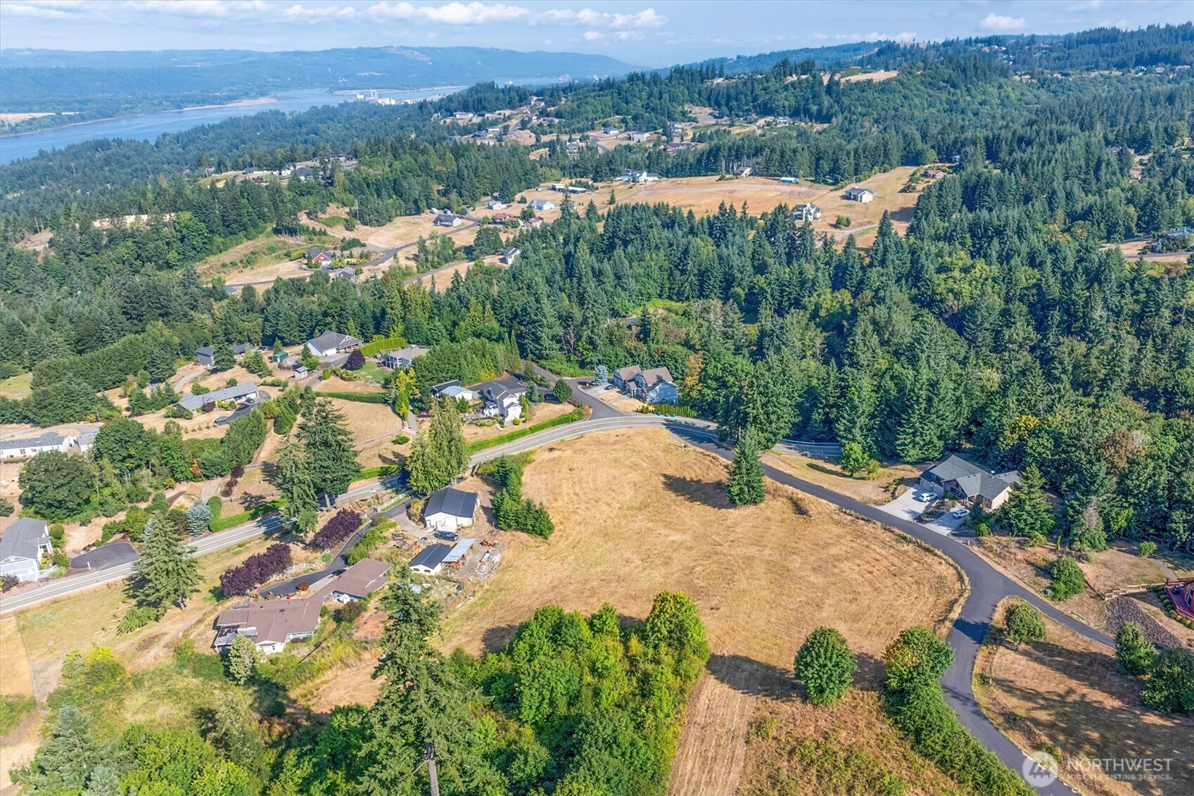 110 Jade Road Woodland, WA 98674 - Photo 20 of 32 an aerial view of residential houses with outdoor space and river