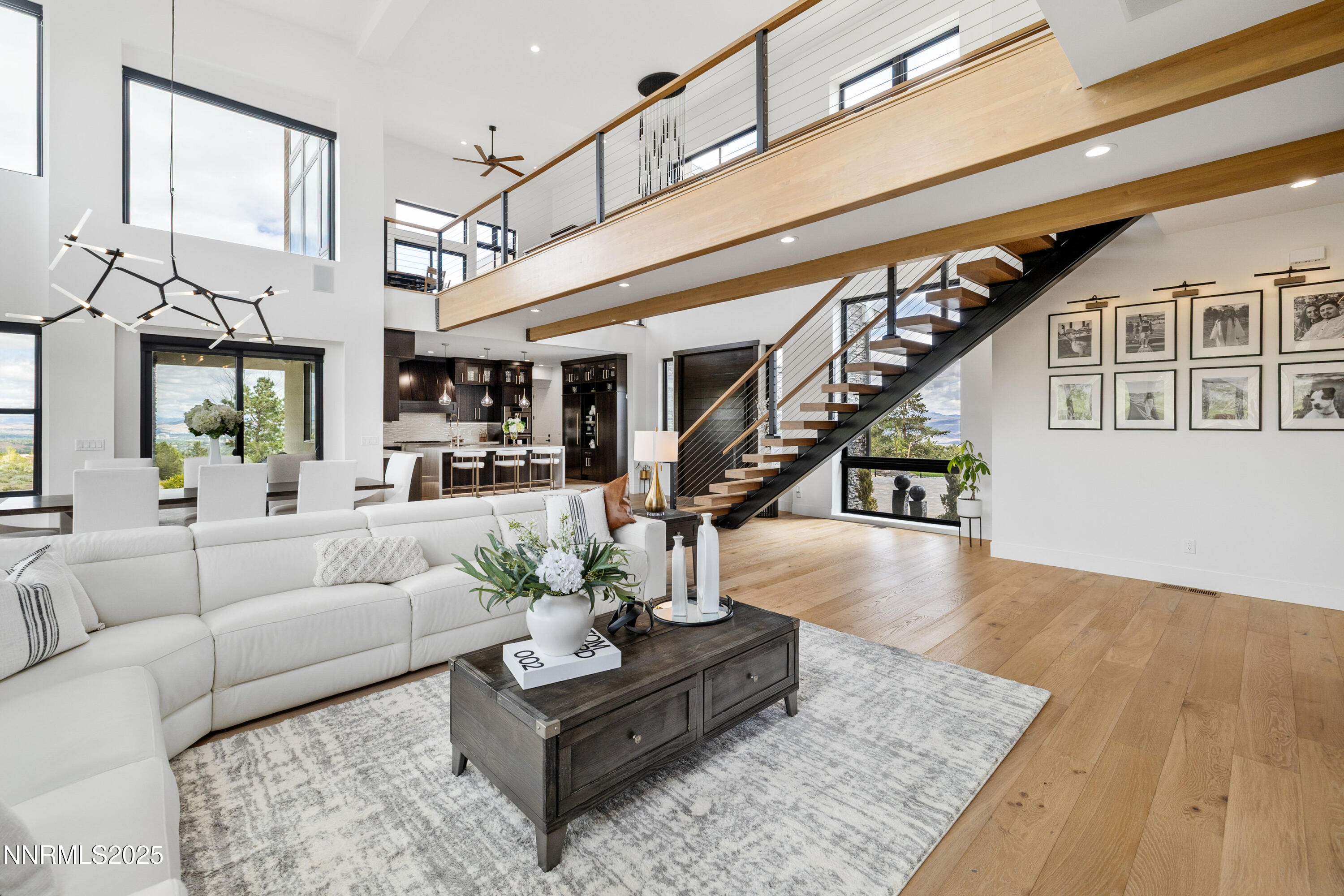 3041 Palmer Pointe Court Reno, NV 89511 - Photo 12 of 40 a living room with furniture or chandelier and a wooden floor