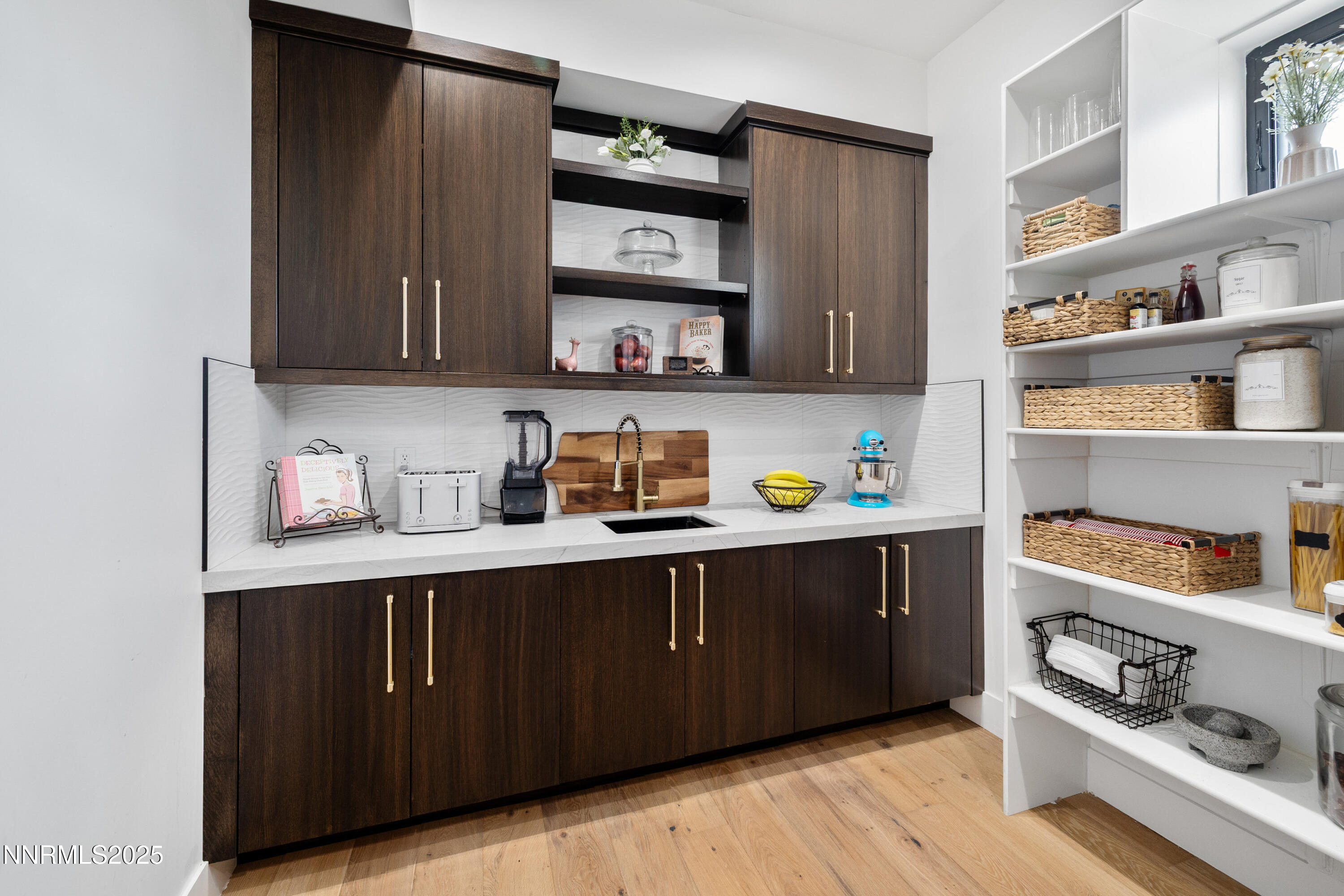 3041 Palmer Pointe Court Reno, NV 89511 - Photo 15 of 40 a kitchen with stainless steel appliances granite countertop wooden cabinets and sink