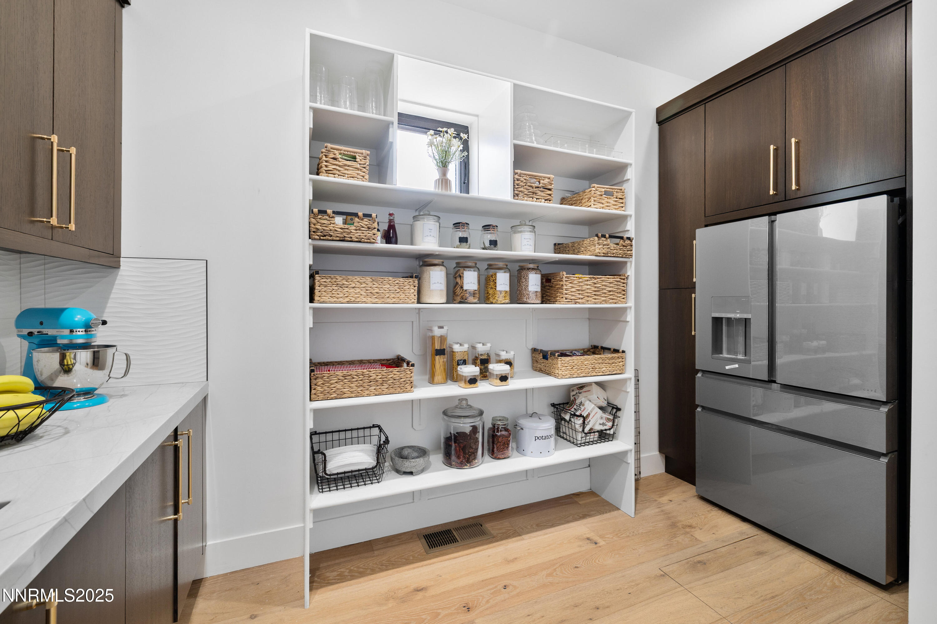 3041 Palmer Pointe Court Reno, NV 89511 - Photo 16 of 40 a kitchen with stainless steel appliances granite countertop a refrigerator and a cabinets