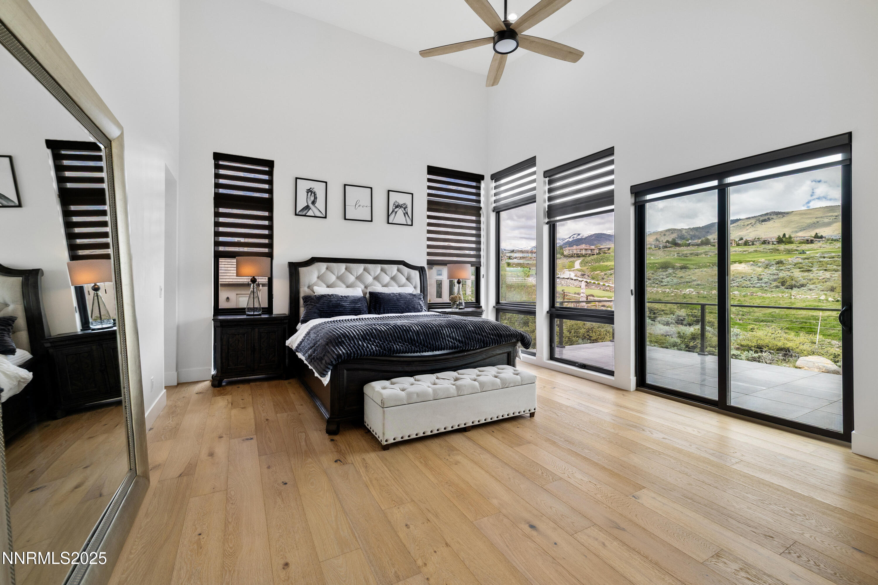 3041 Palmer Pointe Court Reno, NV 89511 - Photo 17 of 40 a living room with a bed furniture and a large window