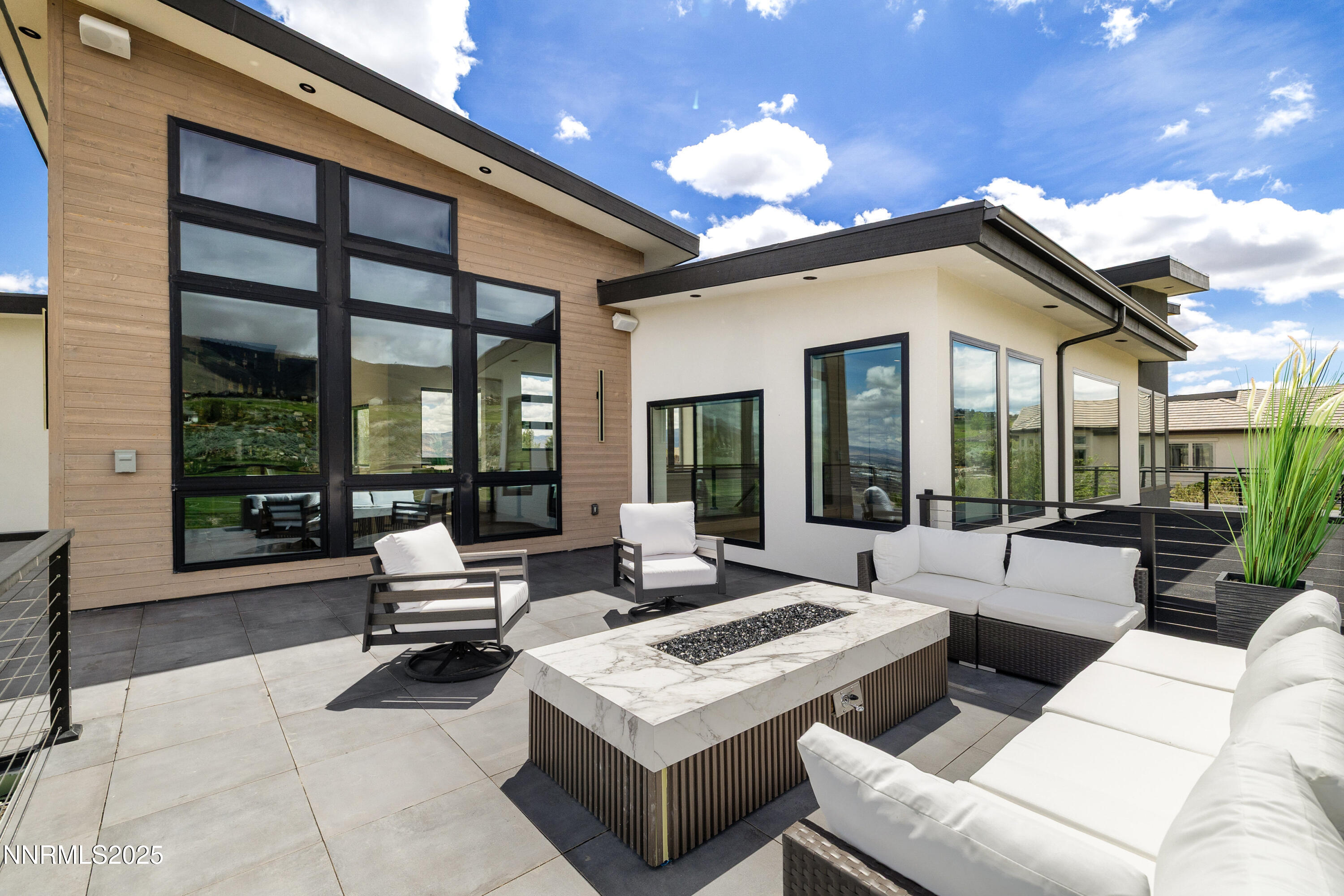 3041 Palmer Pointe Court Reno, NV 89511 - Photo 26 of 40 a living room with furniture and a large window