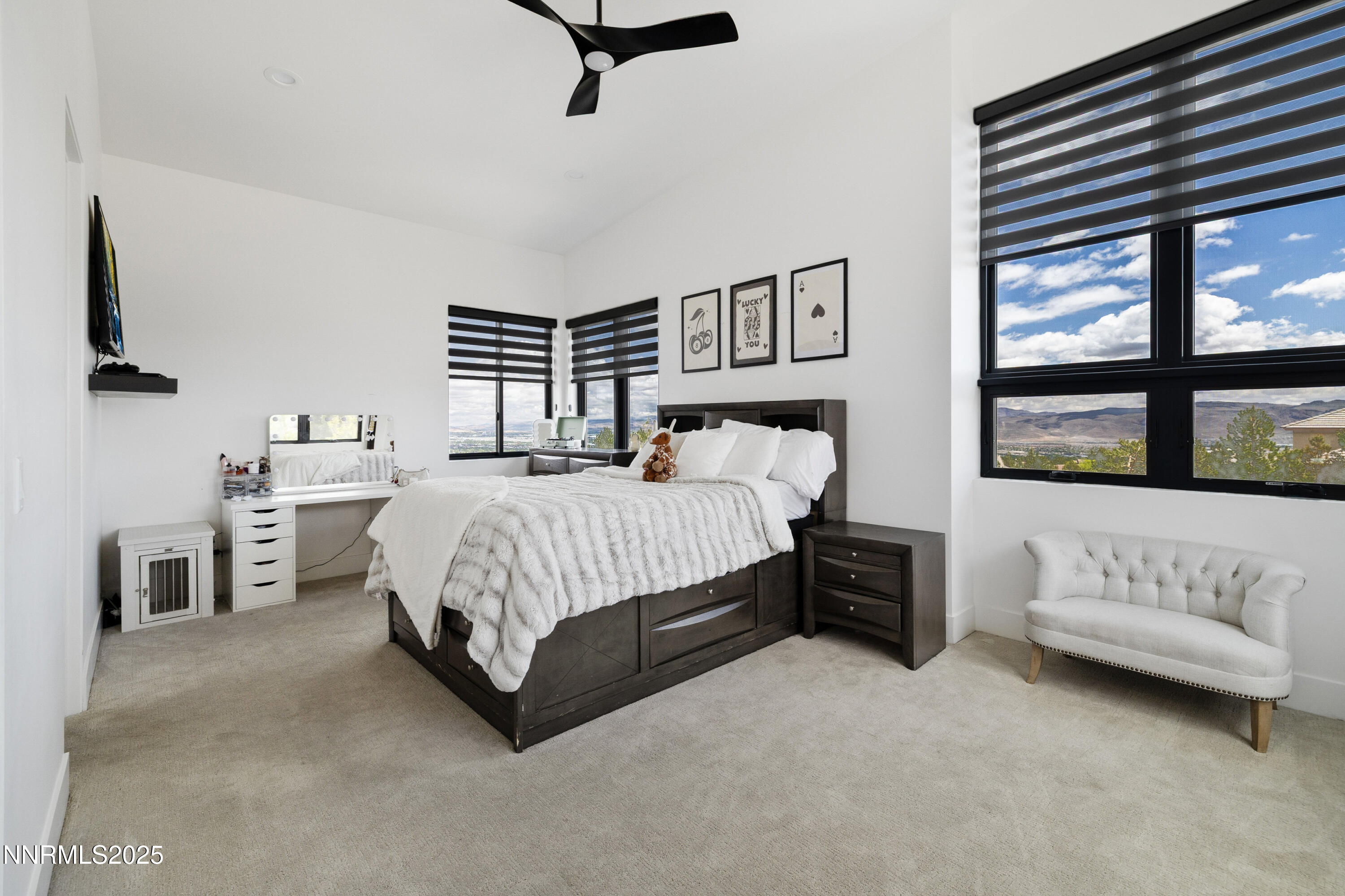 3041 Palmer Pointe Court Reno, NV 89511 - Photo 33 of 40 a bedroom with a bed couch and window