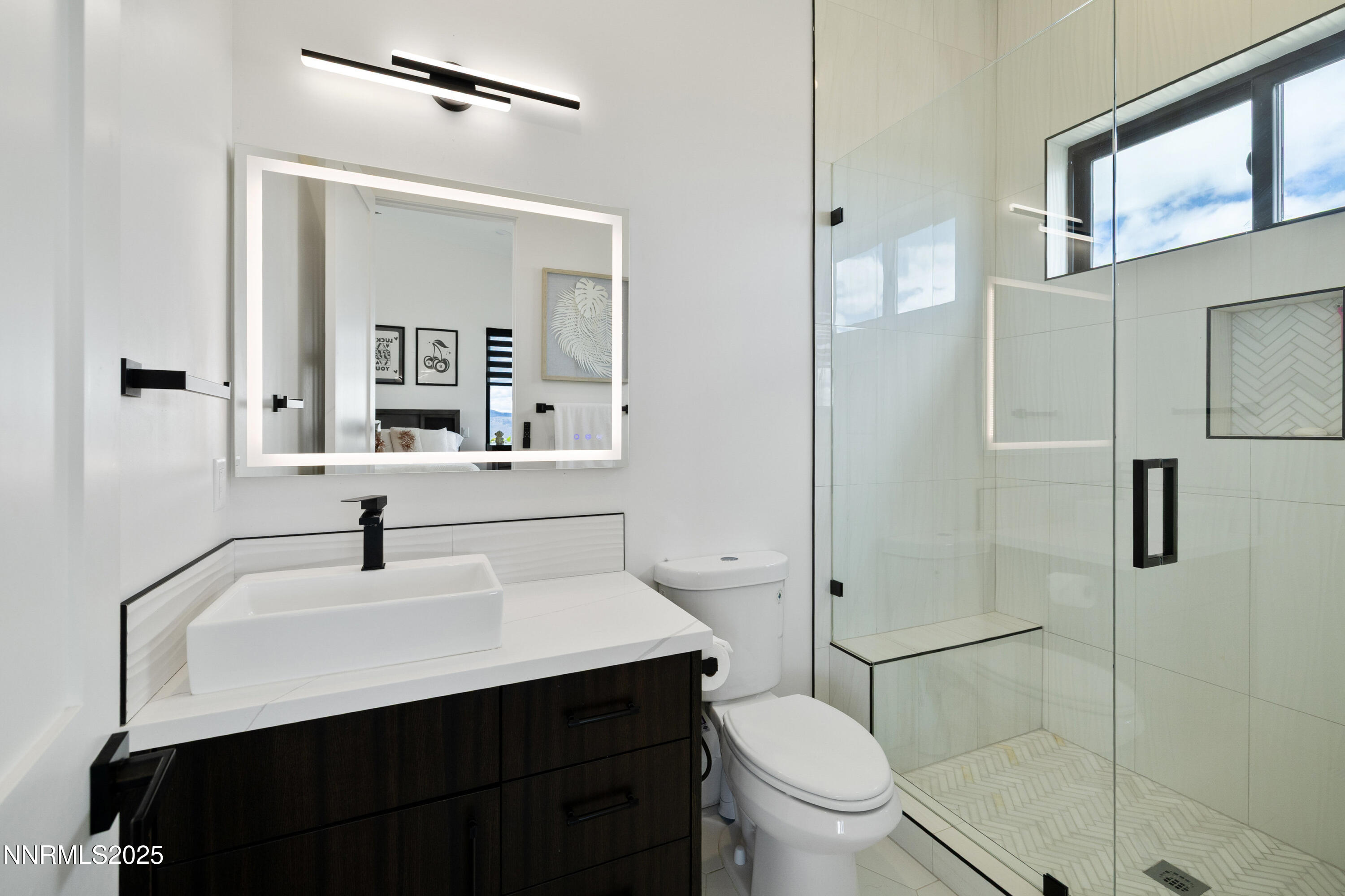 3041 Palmer Pointe Court Reno, NV 89511 - Photo 34 of 40 a bathroom with a sink a toilet and shower