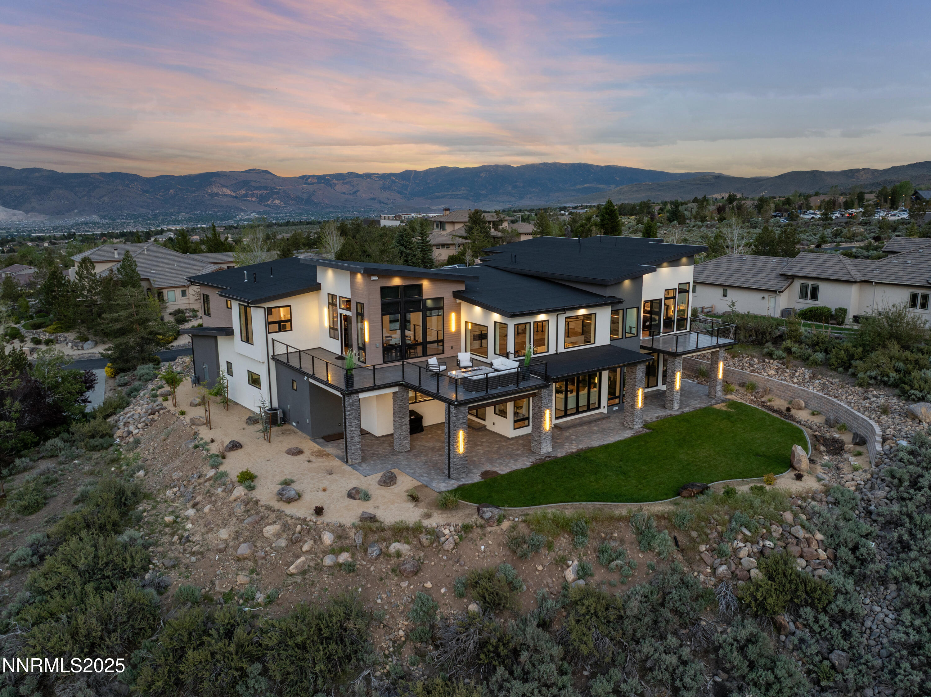 3041 Palmer Pointe Court Reno, NV 89511 - Photo 38 of 40 an aerial view of a house with a garden and lake view