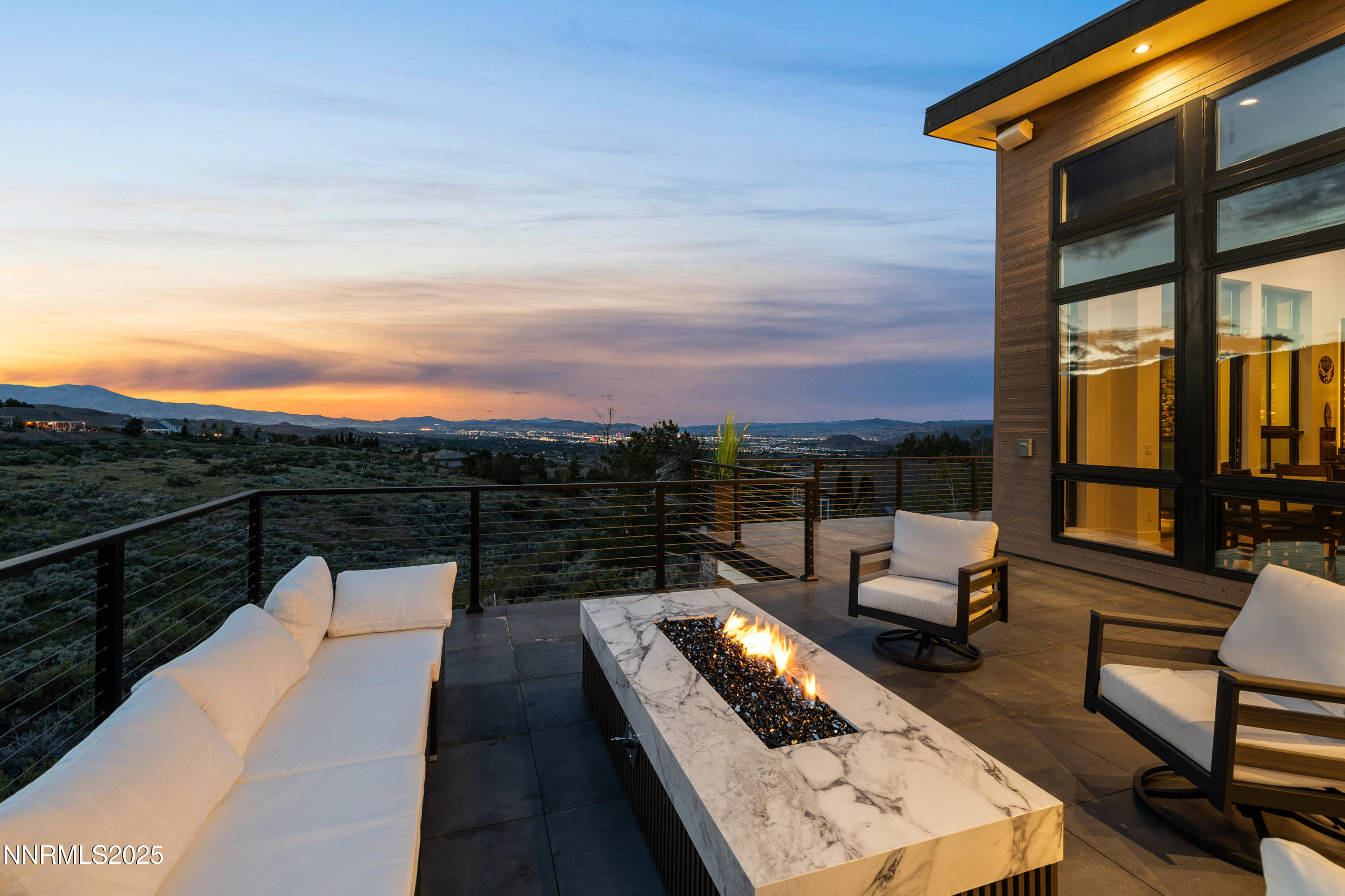 3041 Palmer Pointe Court Reno, NV 89511 - Photo 4 of 40 a view of roof deck with couches and city view