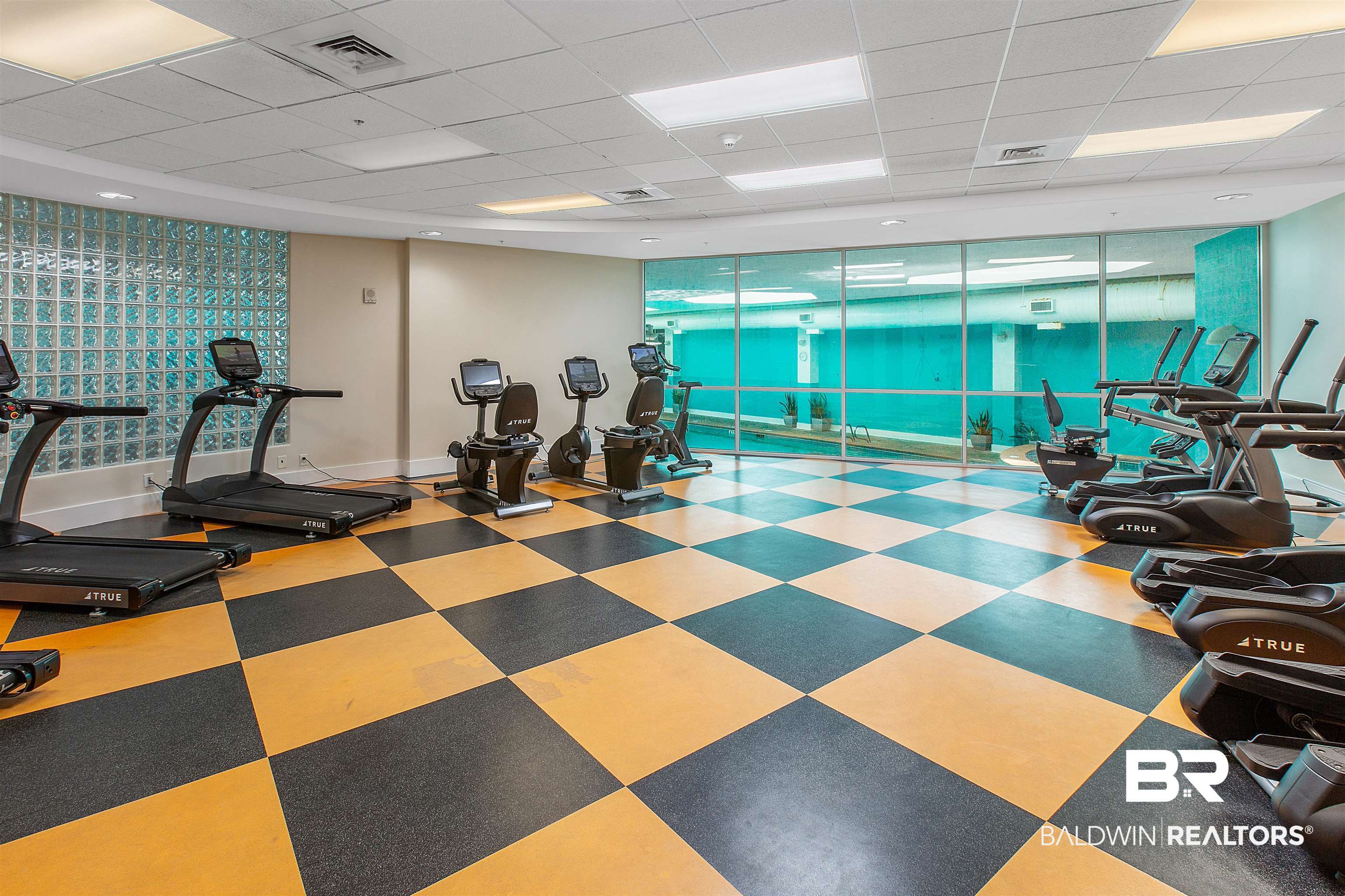 28107 Perdido Beach Boulevard, Unit DPH06 Orange Beach, AL 36561 - Photo 38 of 70 Workout area with a paneled ceiling