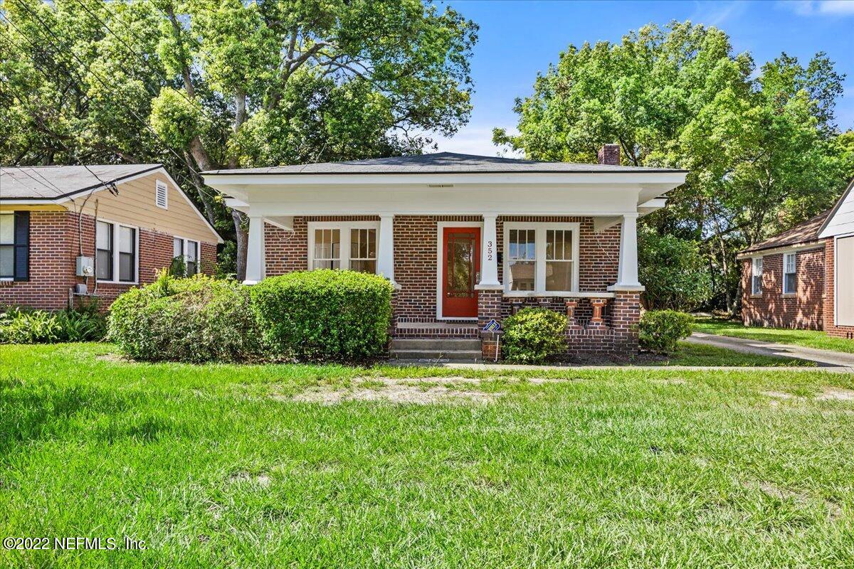 352 West 68th Street Jacksonville, FL 32208 - Photo 1 of 11 front view of a house and a yard