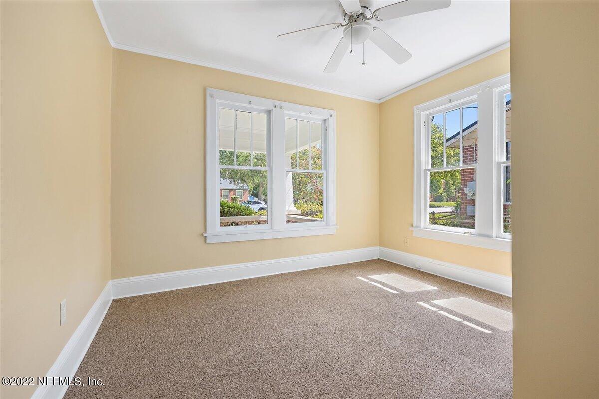 352 West 68th Street Jacksonville, FL 32208 - Photo 7 of 11 a view of an empty room with a window