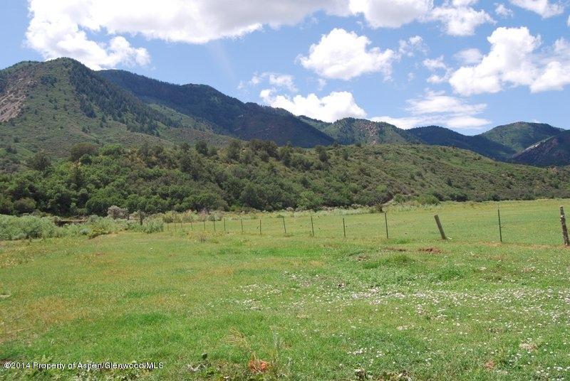 8175 County Road 252 Rifle, CO 81650 - Photo 19 of 39 a view of an outdoor space and mountain view