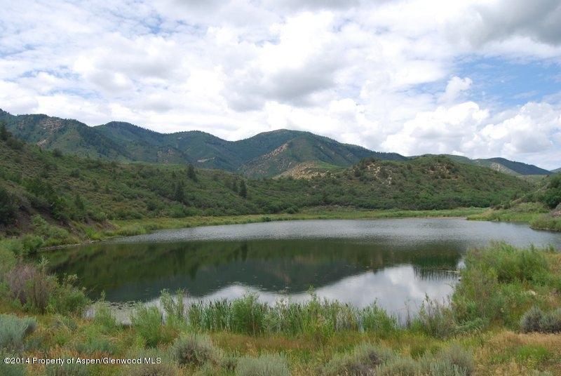 8175 County Road 252 Rifle, CO 81650 - Photo 5 of 39 a view of lake with green space