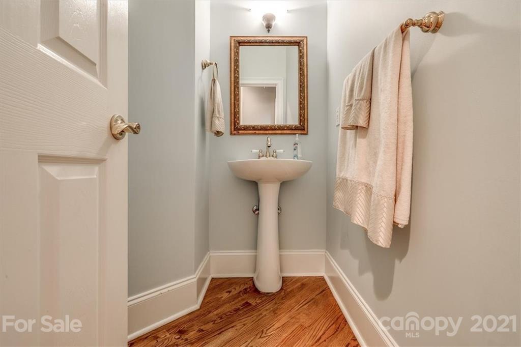 904 Ashford Way Fort Mill, SC 29708 - Photo 22 of 48 a bathroom with a sink and a mirror