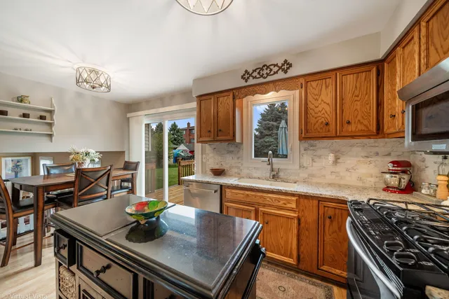 a kitchen with a stove and a sink