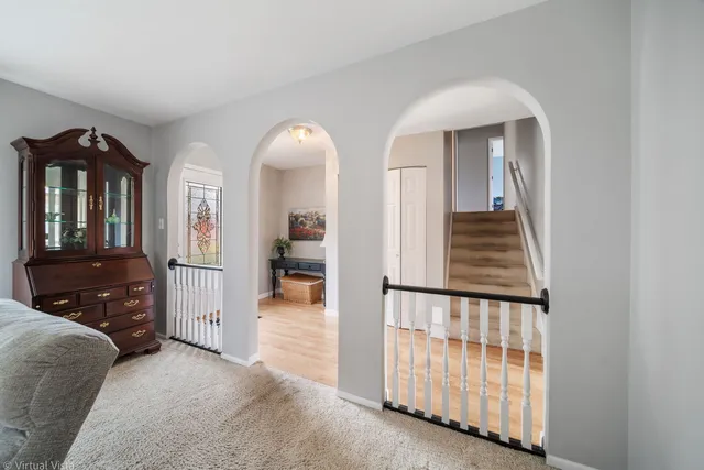 view of hall way with mirror