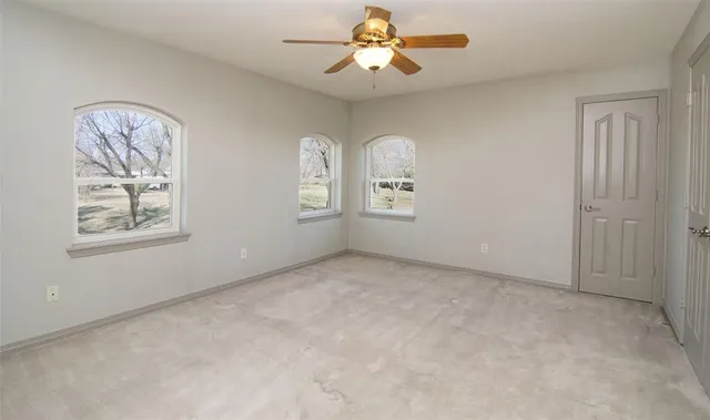 a bathroom with a sink and cabinets