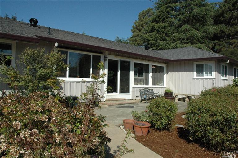1945-1947 Schaeffer Road Sebastopol, CA 95472 - Photo 1 of 1 front view of a house with a small yard