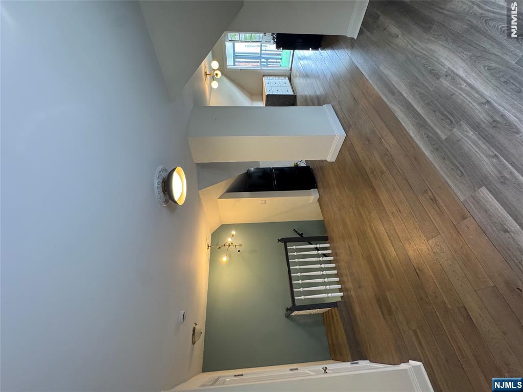 21 Valley Place, Unit 3 Edgewater, NJ 07020 - Photo 15 of 18 a view of hall with wooden floor