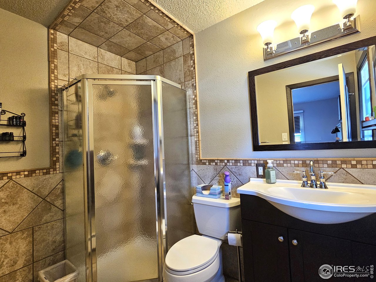 1628 Pheasant Ridge Sterling, CO 80751 - Photo 21 of 40 3/4 bathroom in primary bedroom