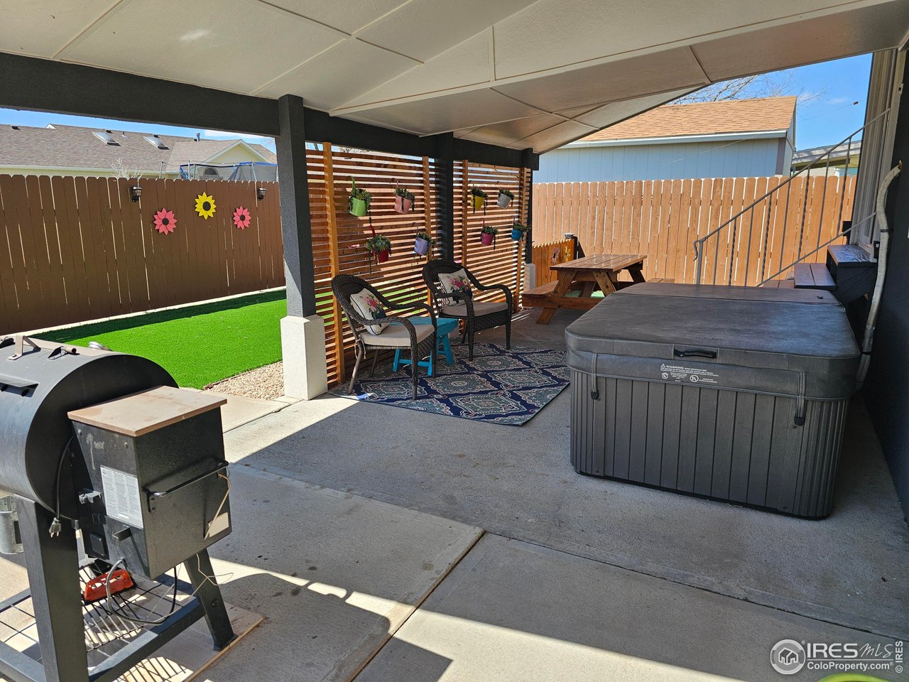 1628 Pheasant Ridge Sterling, CO 80751 - Photo 32 of 40 Covered and protected back patio with hot tub included!