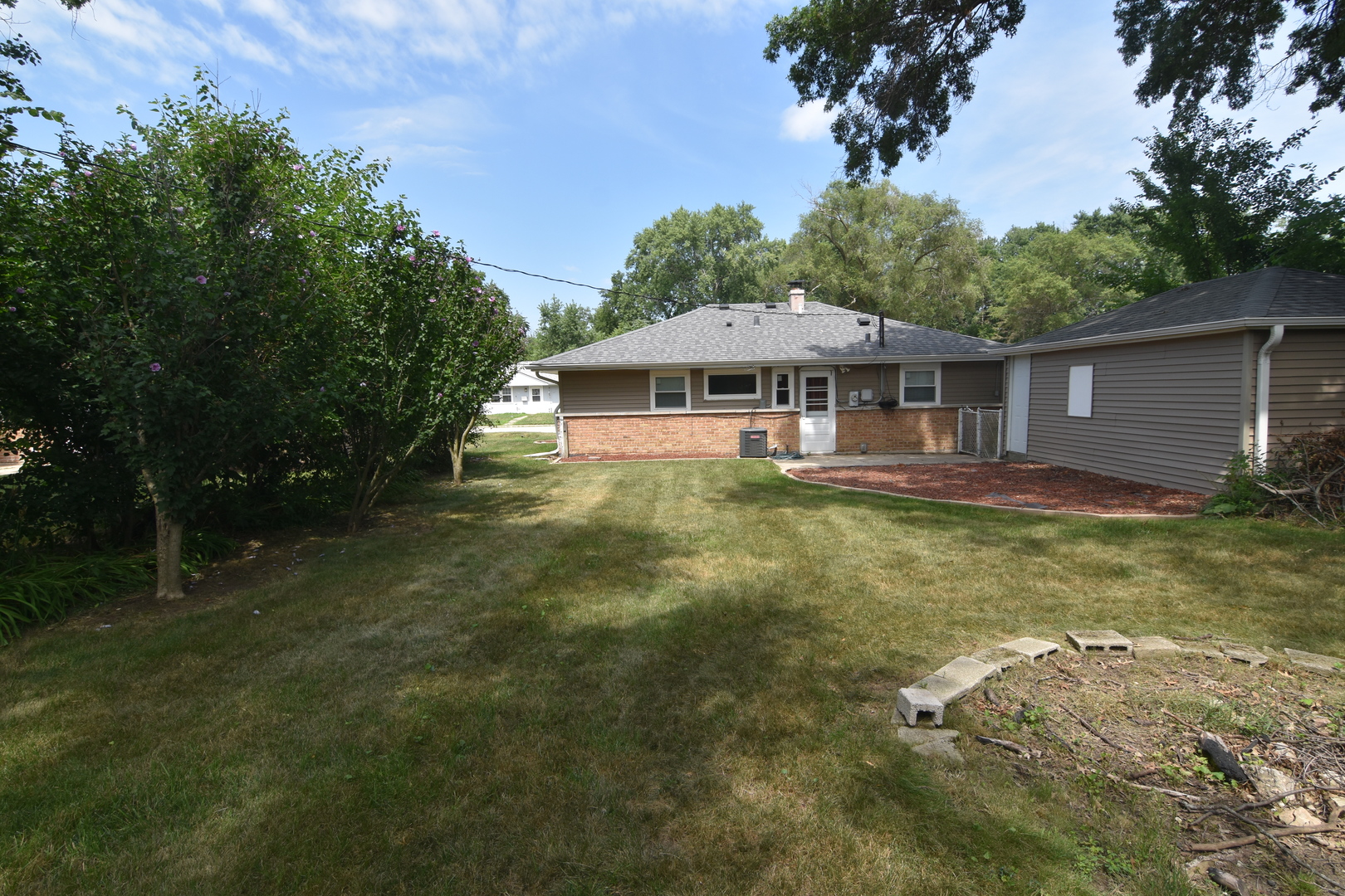 317 Mohawk Street Park Forest, IL 60466 - Photo 14 of 20 a view of a house with a yard balcony and swimming pool
