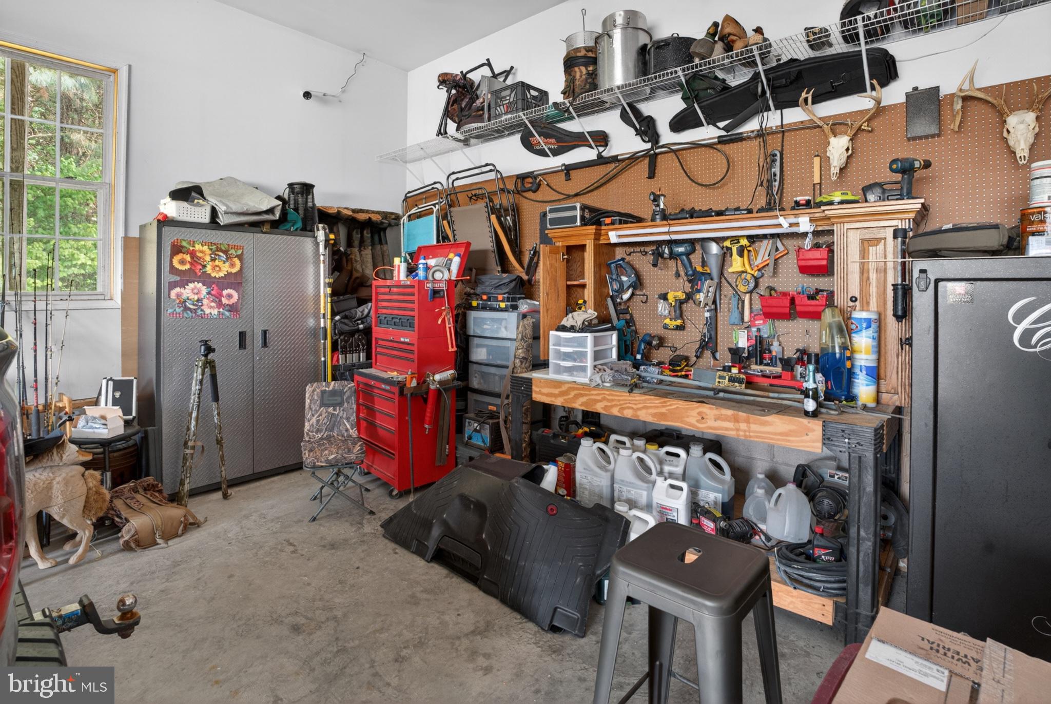 2435 Payne Road Pocomoke City, MD 21851 - Photo 68 of 75 Well-equipped garage for DIY projects.