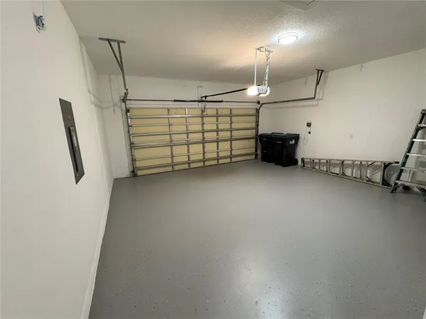 a view of a garage with furniture