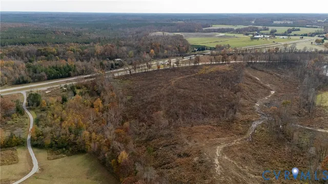 a view of a town with mountains in the background