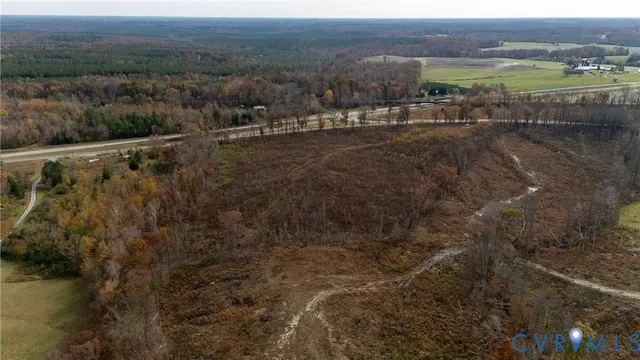 a view of a town with mountains in the background