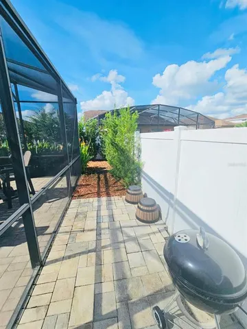 a view of swimming pool with seating space