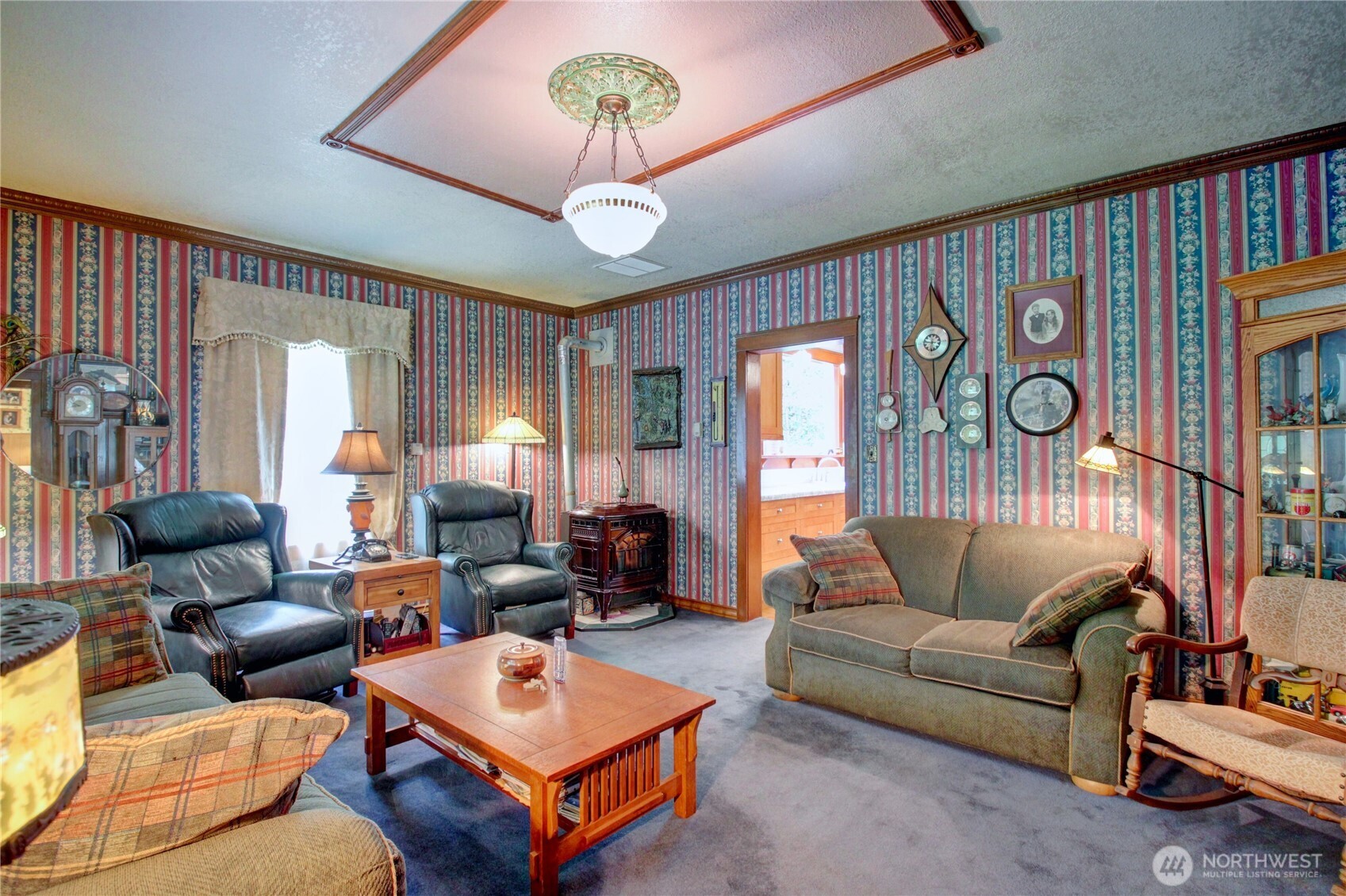 2909 Overpass Road Bow, WA 98232 - Photo 9 of 40 a living room with furniture a ceiling fan and a window