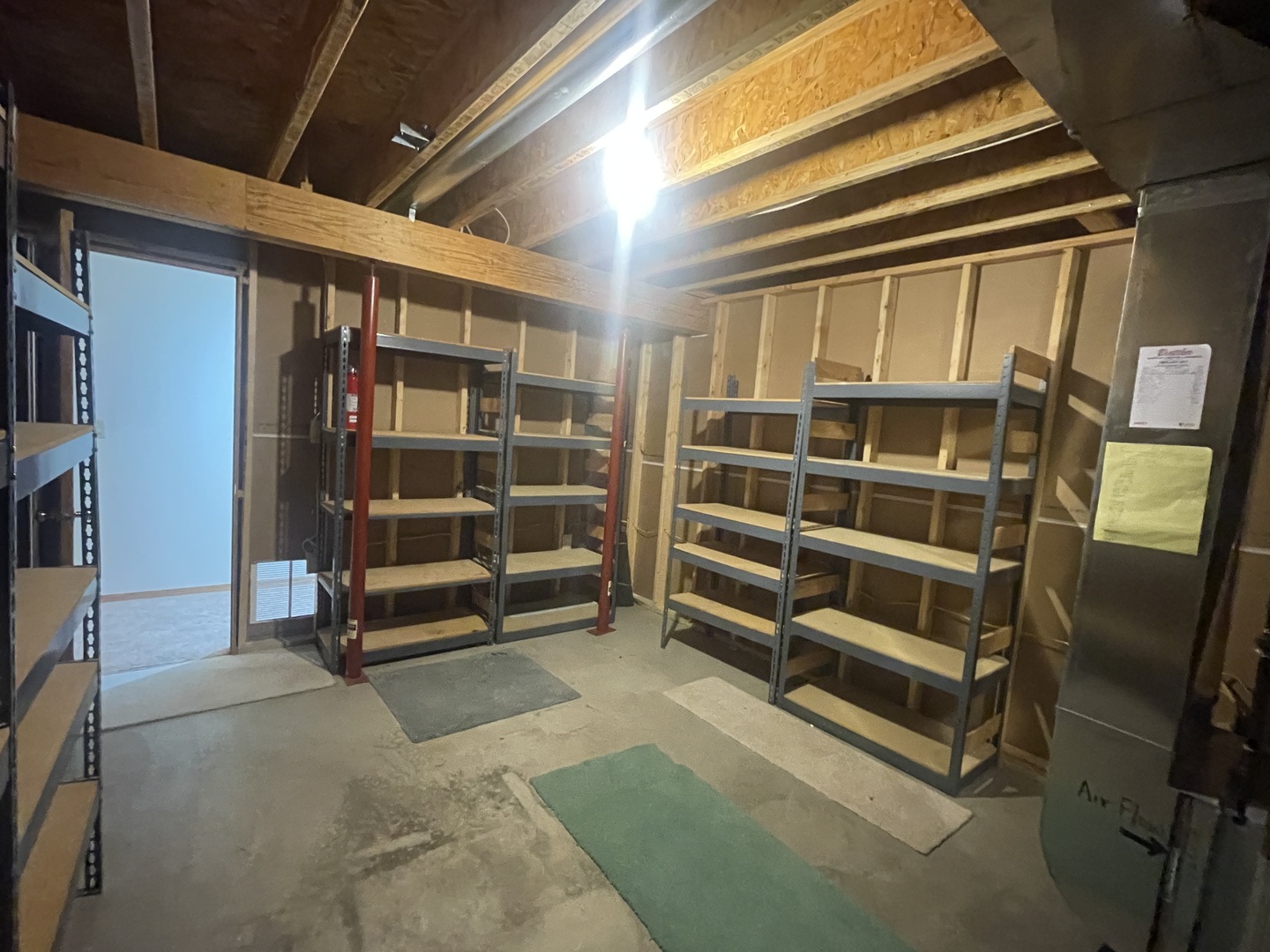 205 Field Court Normal, IL 61761 - Photo 12 of 22 a view of an empty room with a staircase