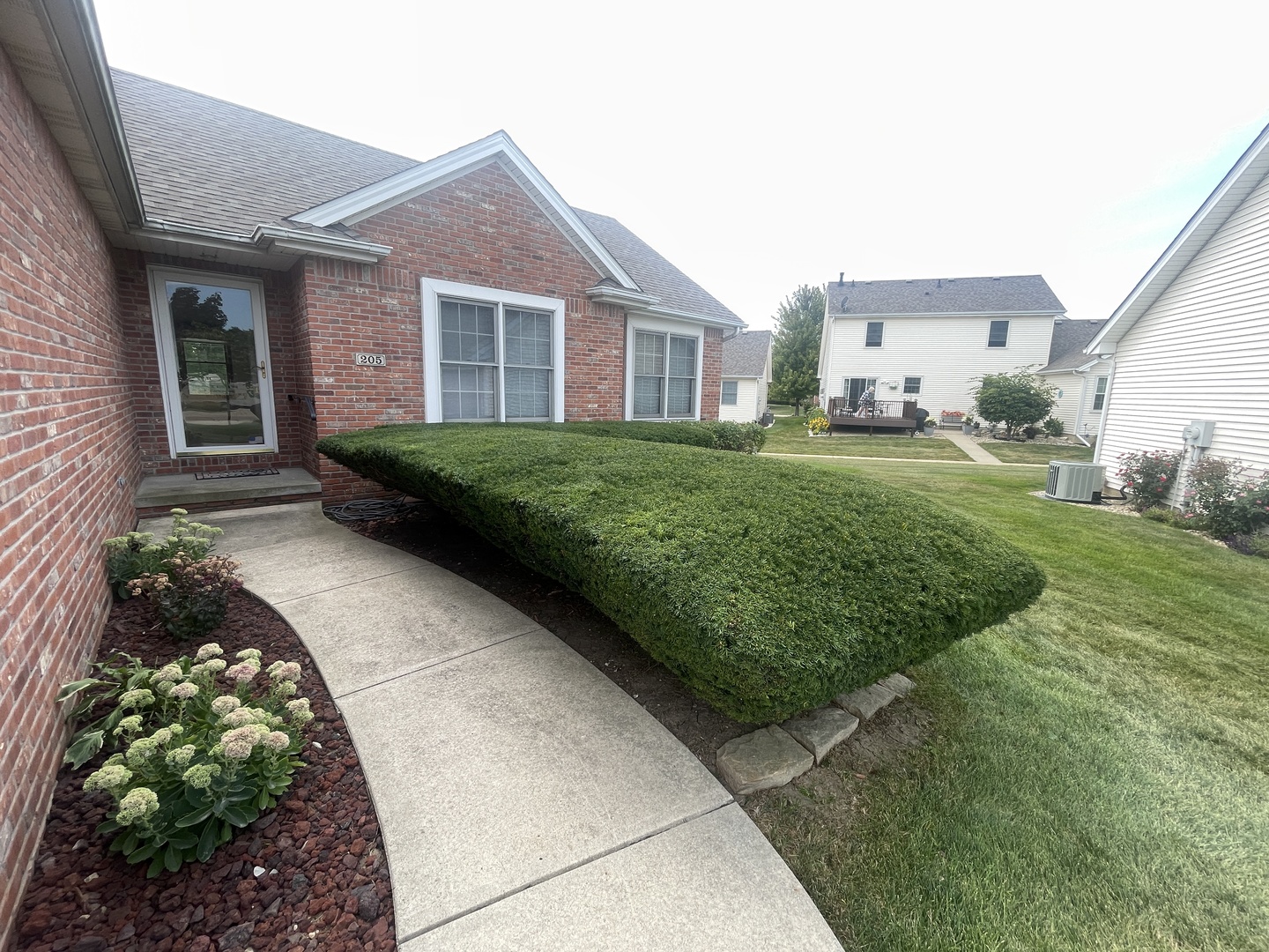 205 Field Court Normal, IL 61761 - Photo 21 of 22 a front view of a house with garden