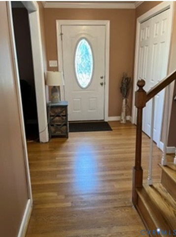 3732 Birdwood Road Richmond, VA 23234 - Photo 5 of 28 a view of a entryway door with wooden floor