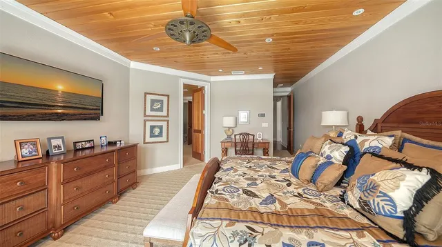 a view of a swimming pool with a table and chairs