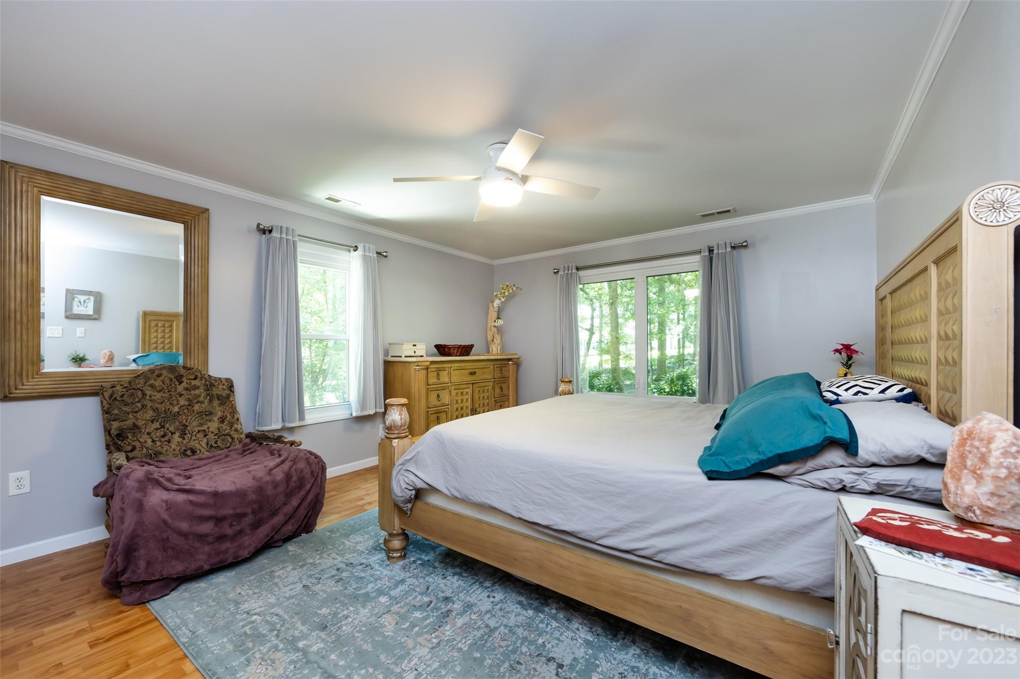 9441 Man O War Road Indian Land, SC 29707 - Photo 11 of 45 a bedroom with a bed couch and windows