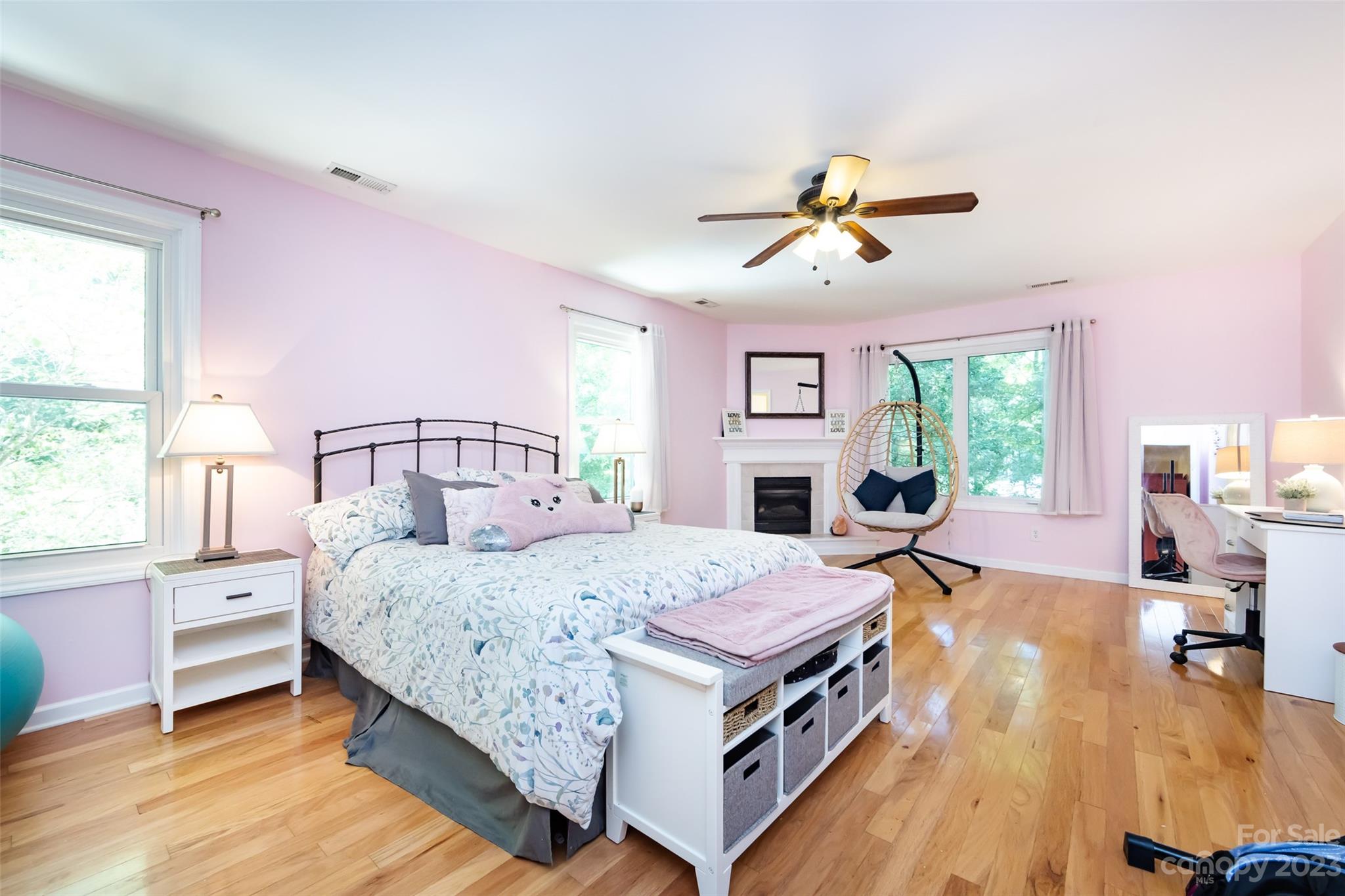 9441 Man O War Road Indian Land, SC 29707 - Photo 25 of 45 a bedroom with a bed and a chandelier