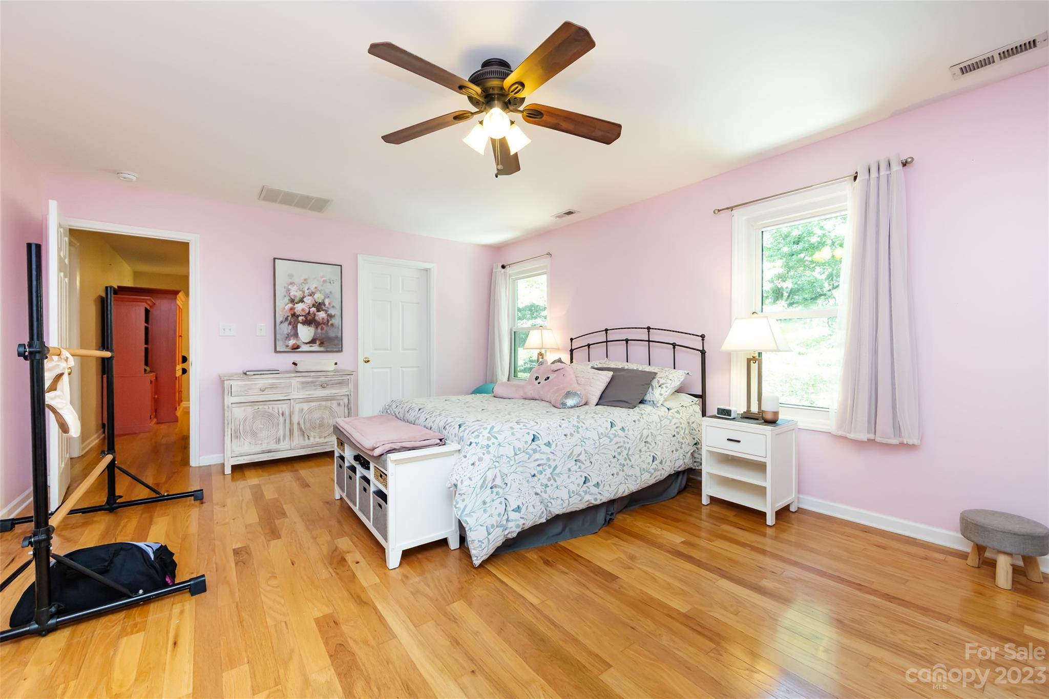 9441 Man O War Road Indian Land, SC 29707 - Photo 26 of 45 a bedroom with a bed and wooden floor