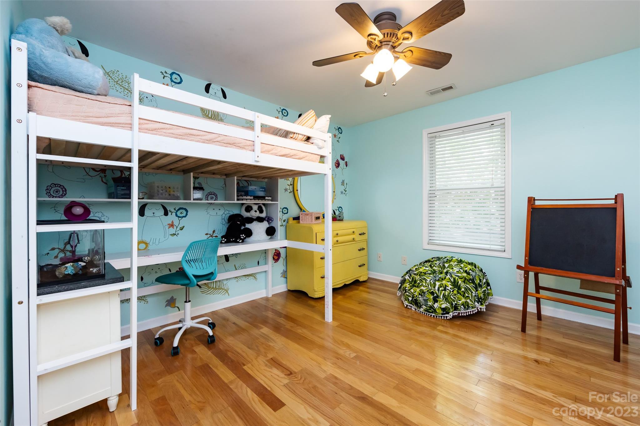 9441 Man O War Road Indian Land, SC 29707 - Photo 30 of 45 a view of workspace with wooden floor and ceiling fan