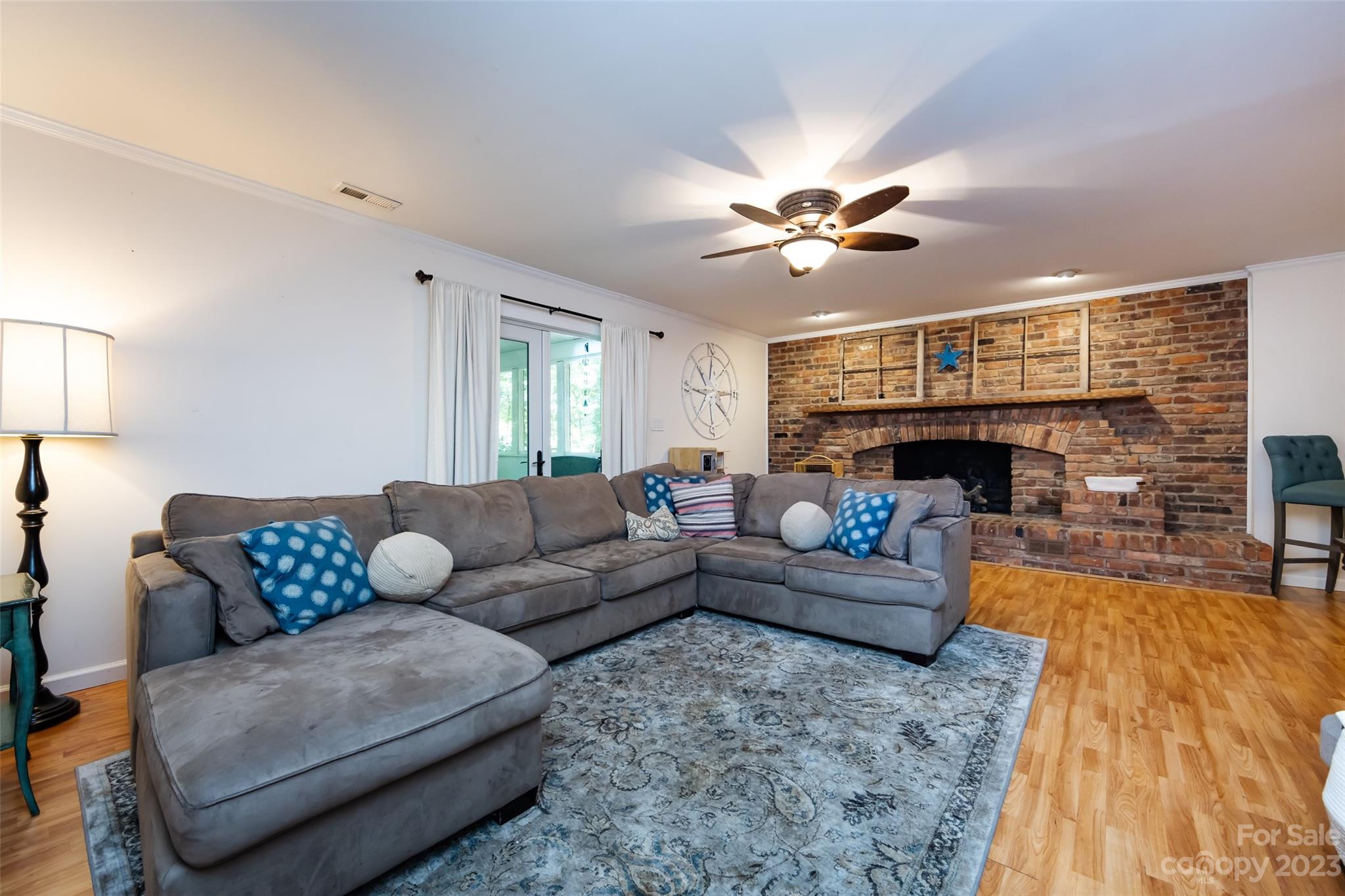 9441 Man O War Road Indian Land, SC 29707 - Photo 3 of 45 a living room with furniture and a fireplace
