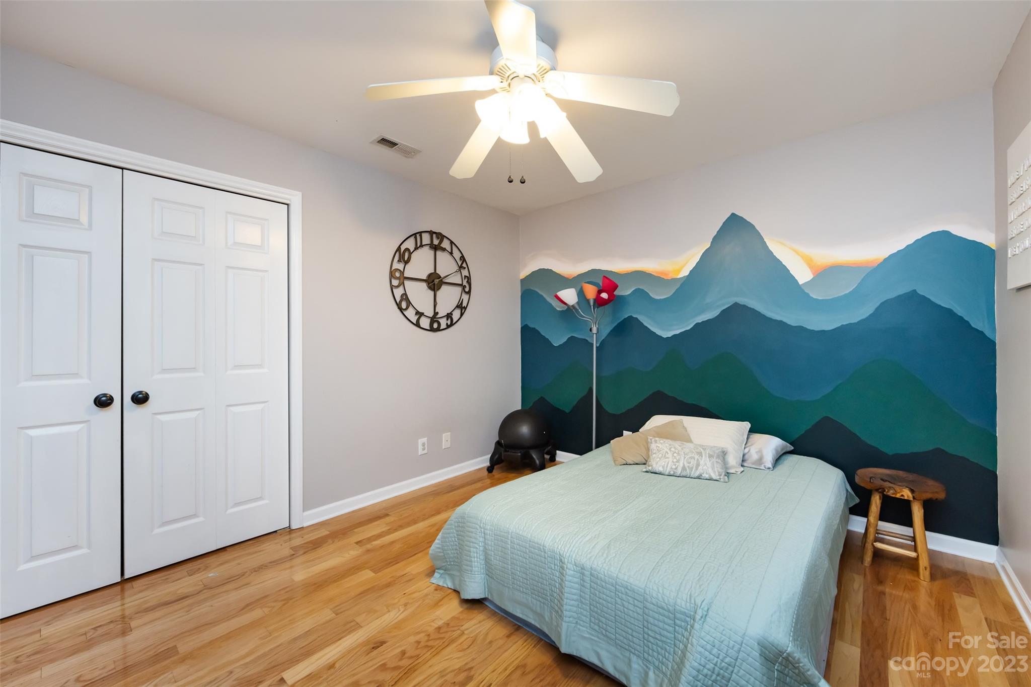 9441 Man O War Road Indian Land, SC 29707 - Photo 34 of 45 a bedroom with a bed and a chandelier