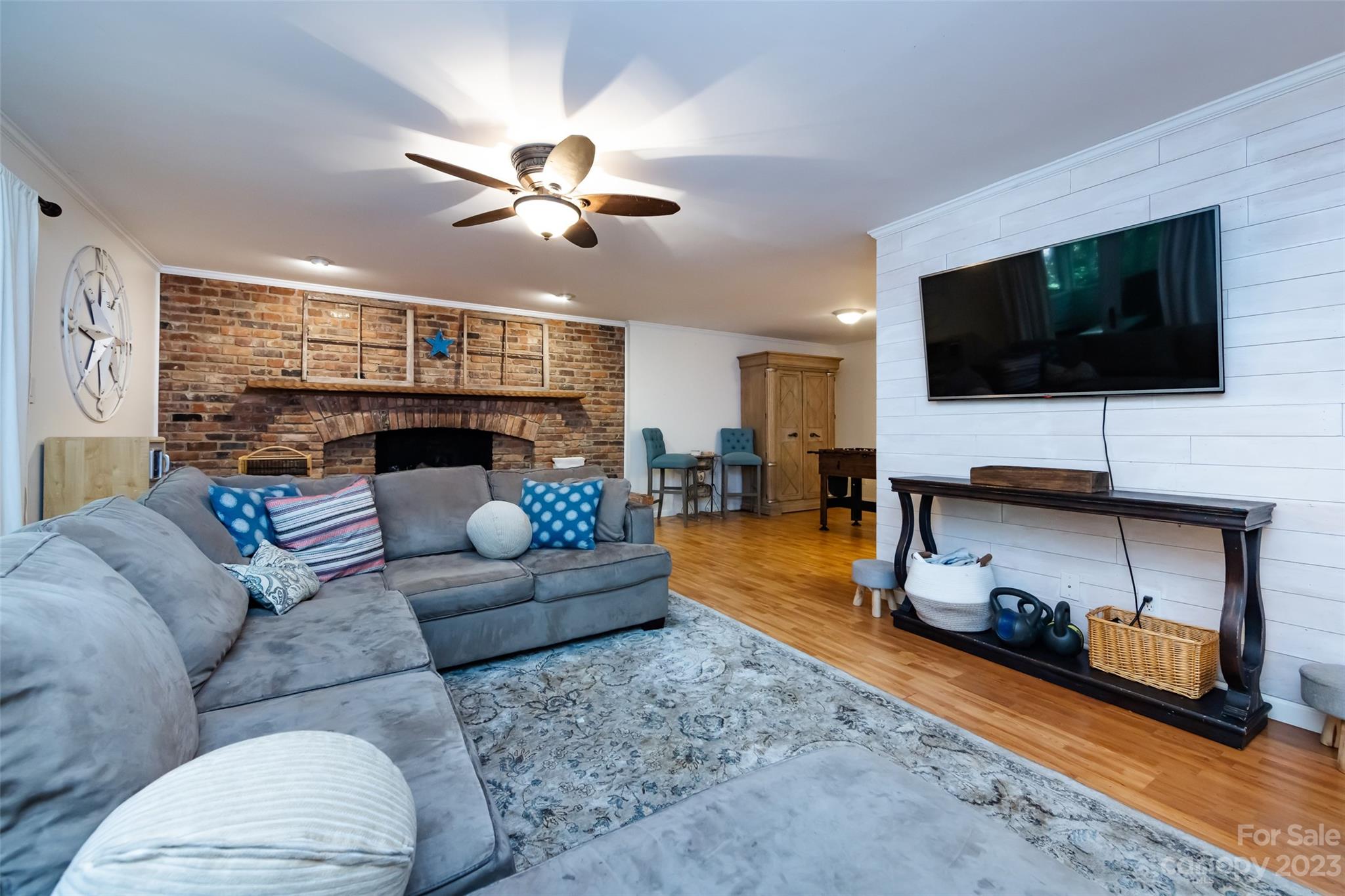 9441 Man O War Road Indian Land, SC 29707 - Photo 4 of 45 a living room with furniture and a flat screen tv