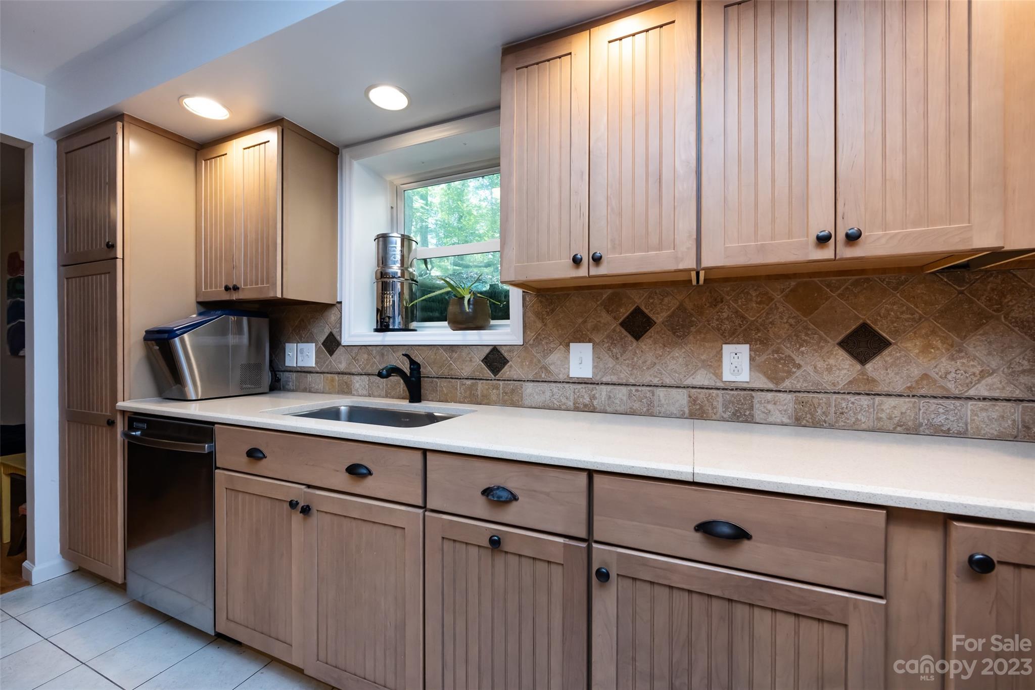 9441 Man O War Road Indian Land, SC 29707 - Photo 8 of 45 a kitchen with stainless steel appliances granite countertop white cabinets a sink and dishwasher