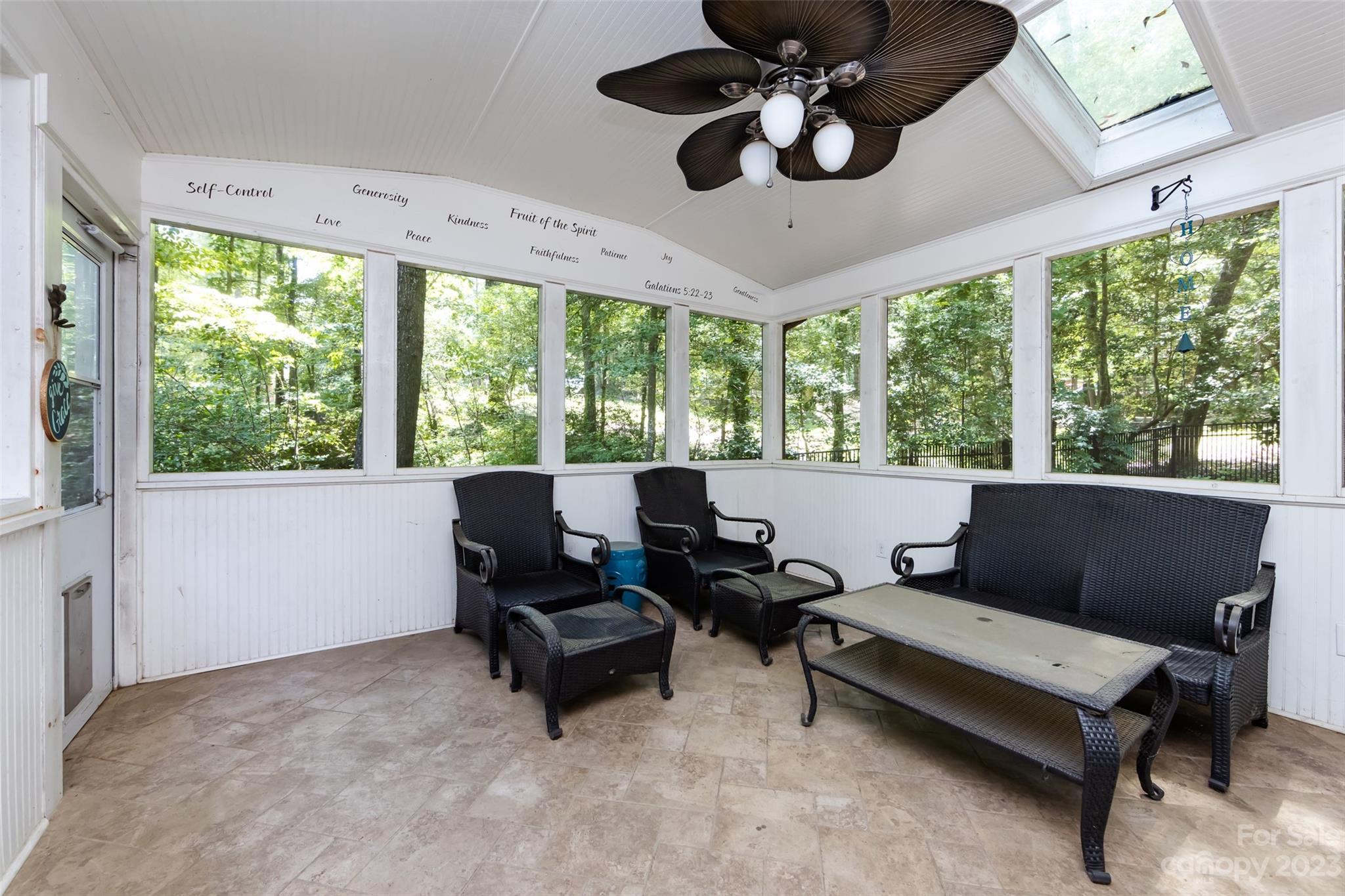 9441 Man O War Road Indian Land, SC 29707 - Photo 10 of 45 a living room with furniture and a large window