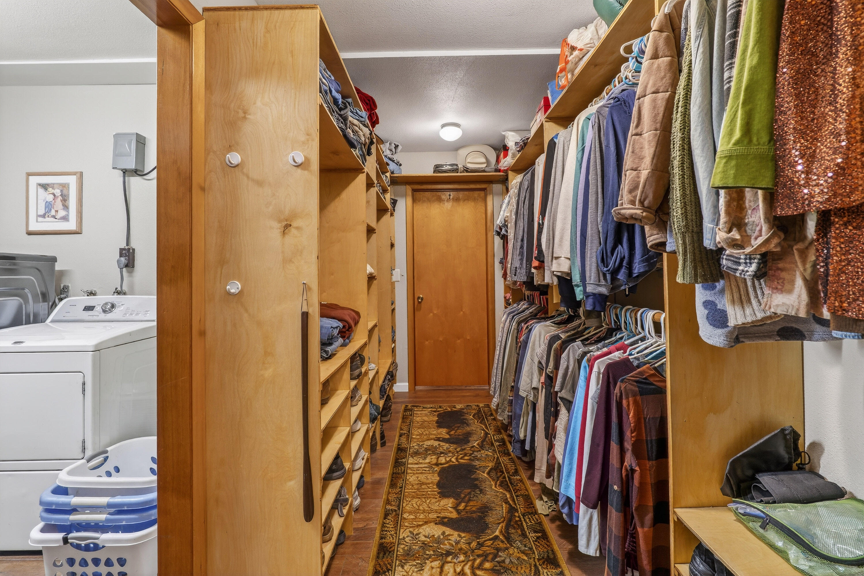 244 Riessen Road Grants Pass, OR 97526 - Photo 22 of 52 a view of walk in closet with clothes and shoes