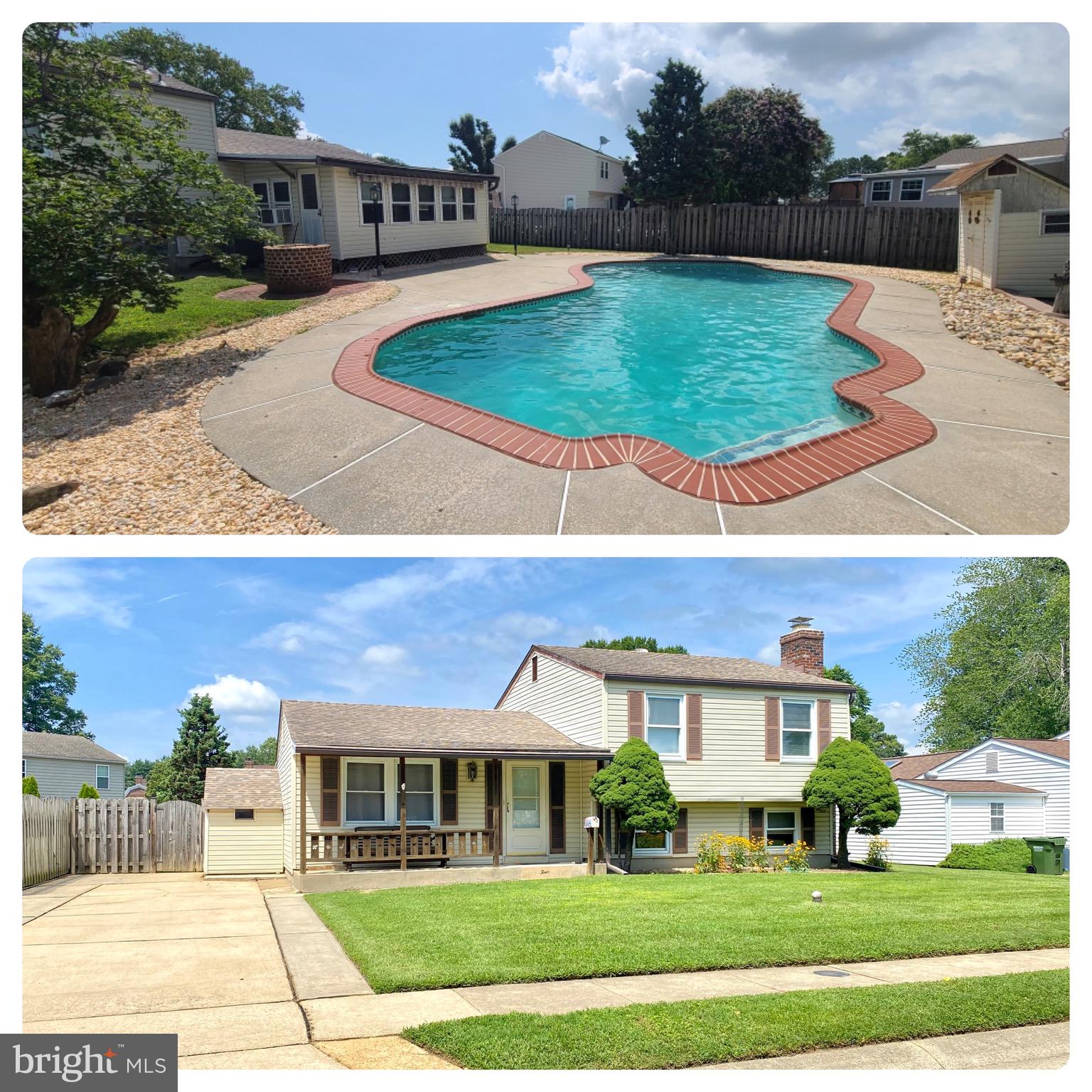 a view of multiple houses with a yard