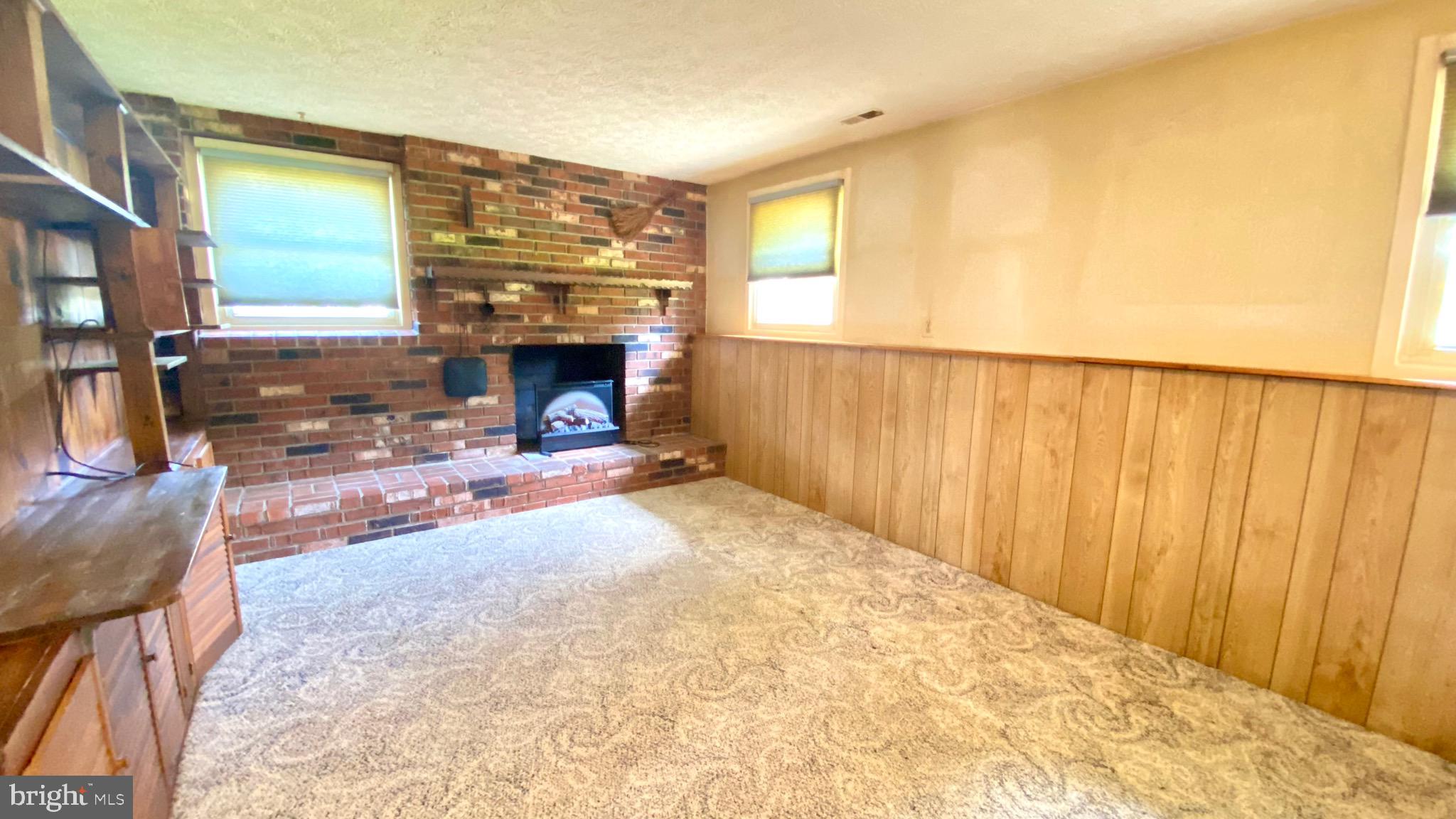 4 Old Sound Road Joppa, MD 21085 - Photo 11 of 20 a view of livingroom with furniture and a fireplace