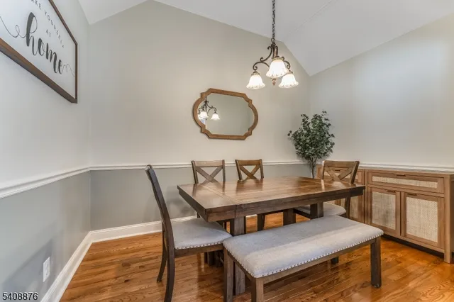 a kitchen with stainless steel appliances a stove a sink and a refrigerator