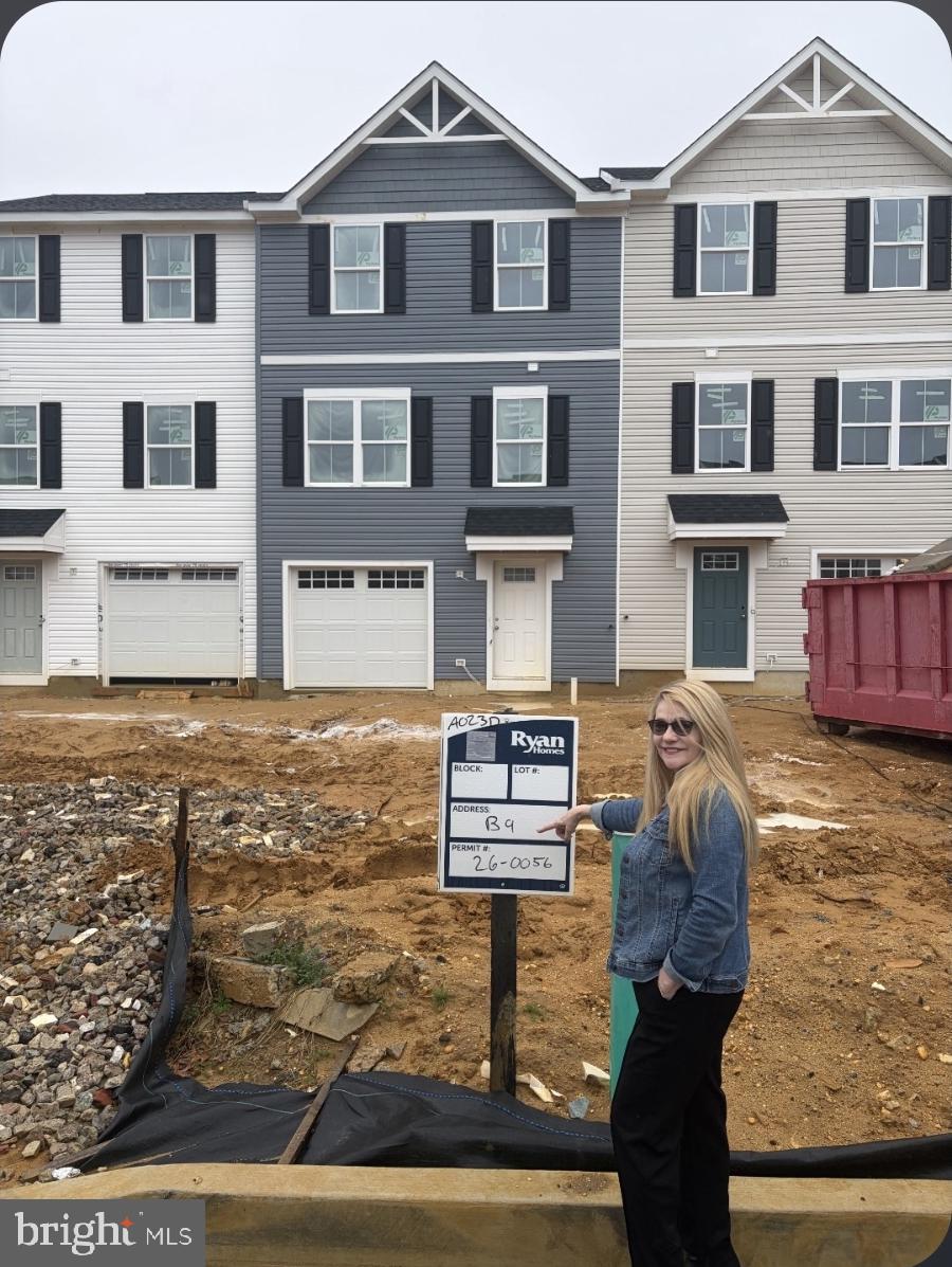 1180 West Walnut Road, Unit 9 Vineland, NJ 08360 - Photo 2 of 17 a front view of a residential apartment building with glass windows